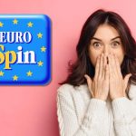 Donna sorpresa e logo Eurospin